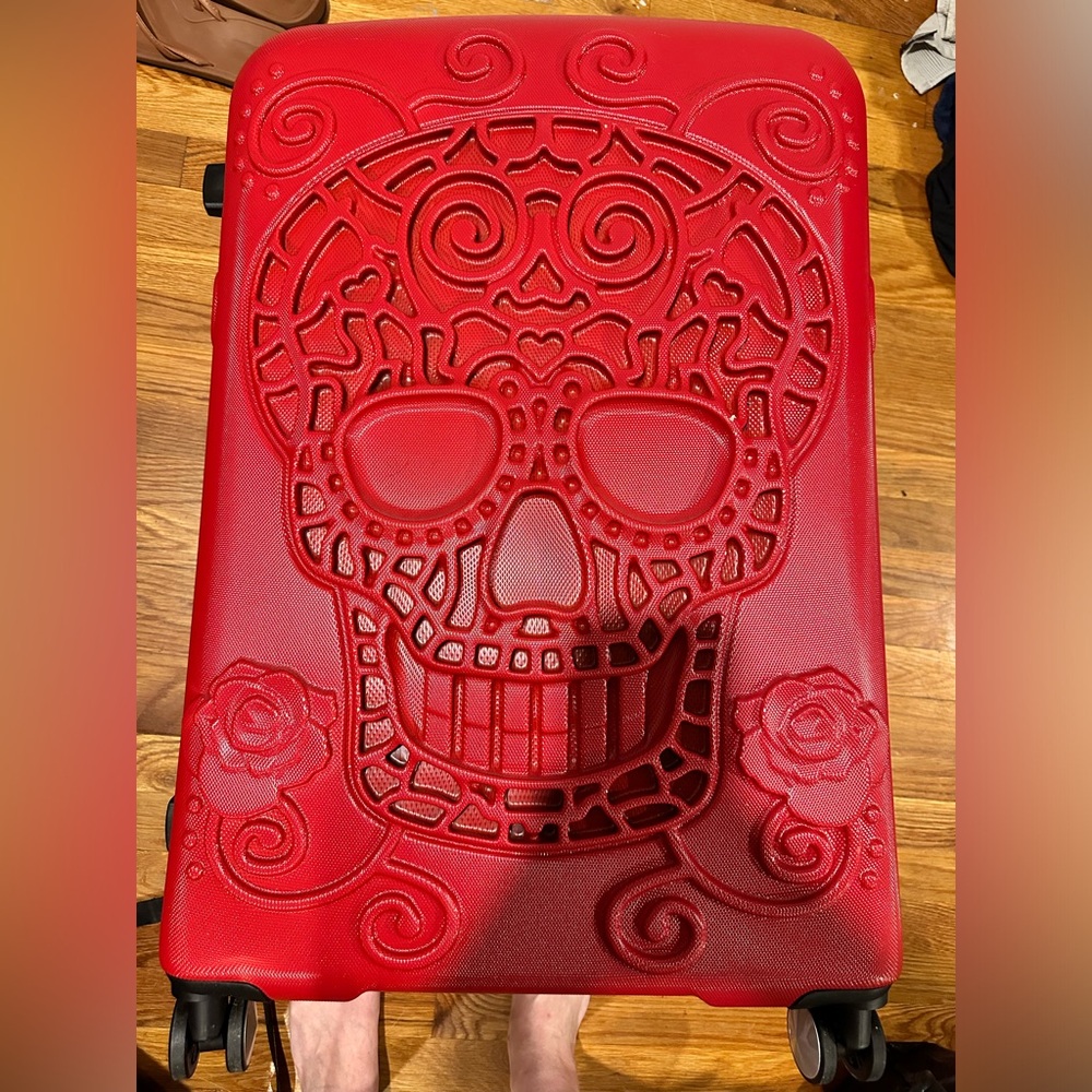 Red Skull suitcase 28”
